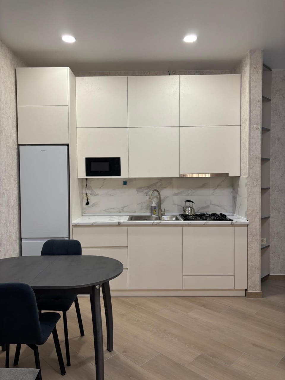 Kitchen or kitchenette, microwave