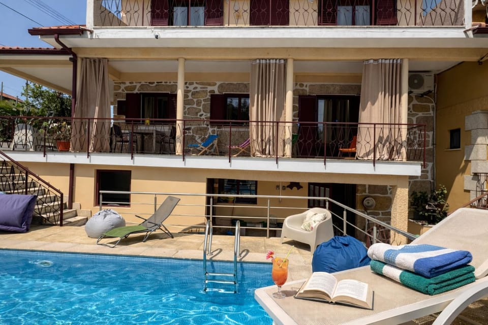 Property building, Patio, Day, View (from property/room), Balcony/Terrace, Pool view, Swimming pool, sunbed