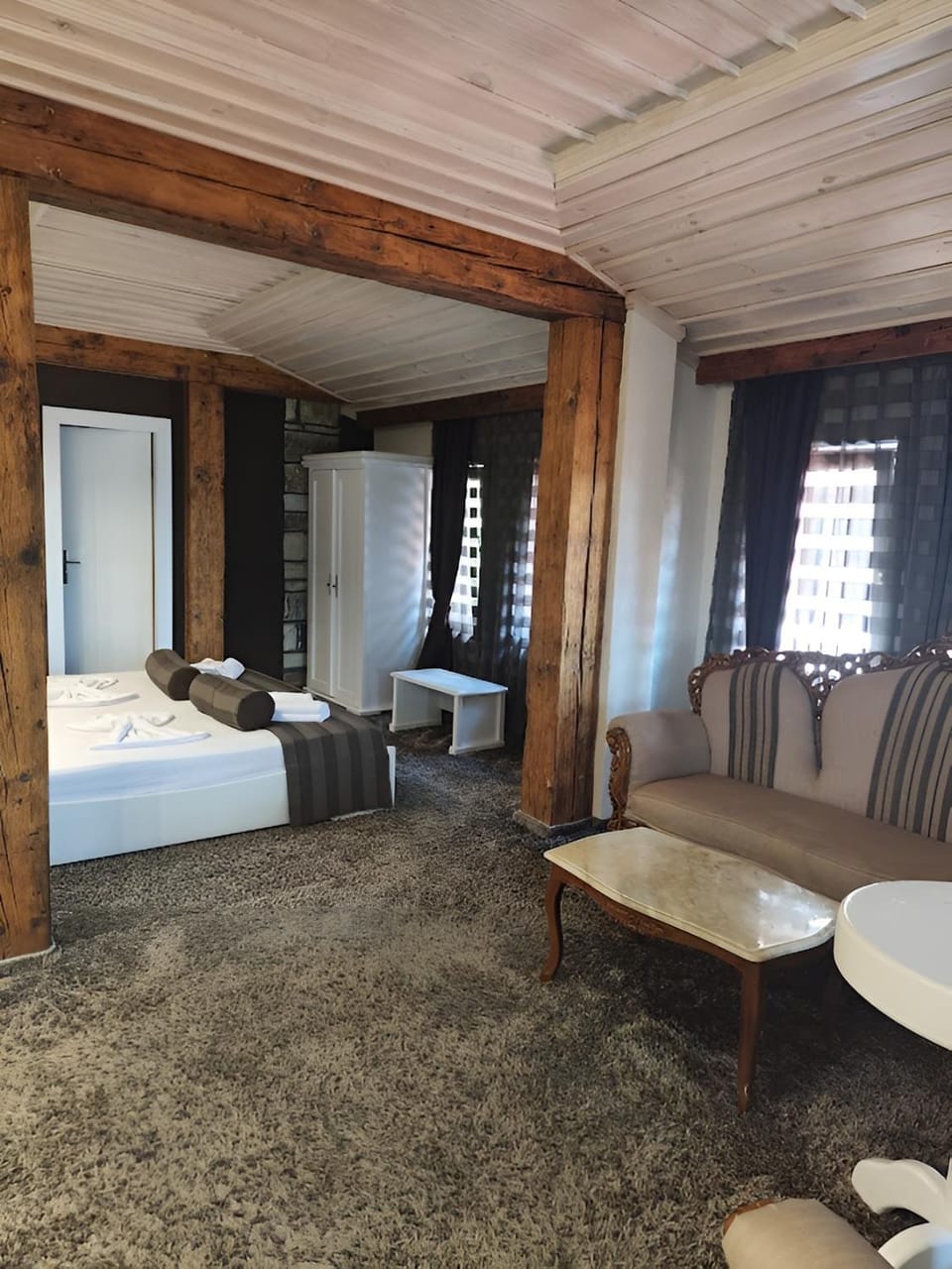 Bed, Living room, Seating area, Bedroom
