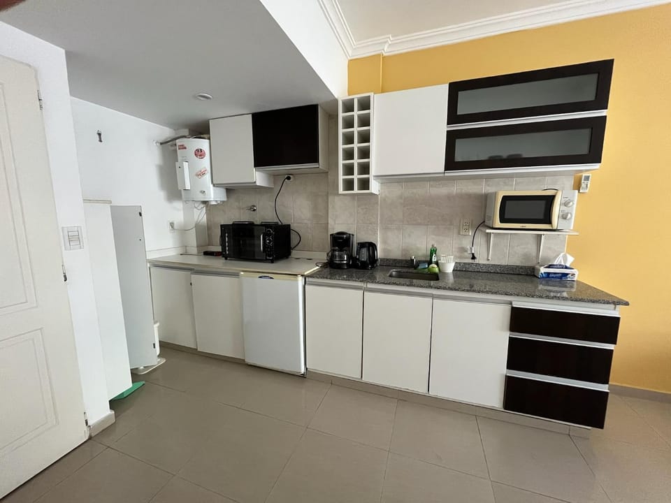 Kitchen or kitchenette, microwave, oven