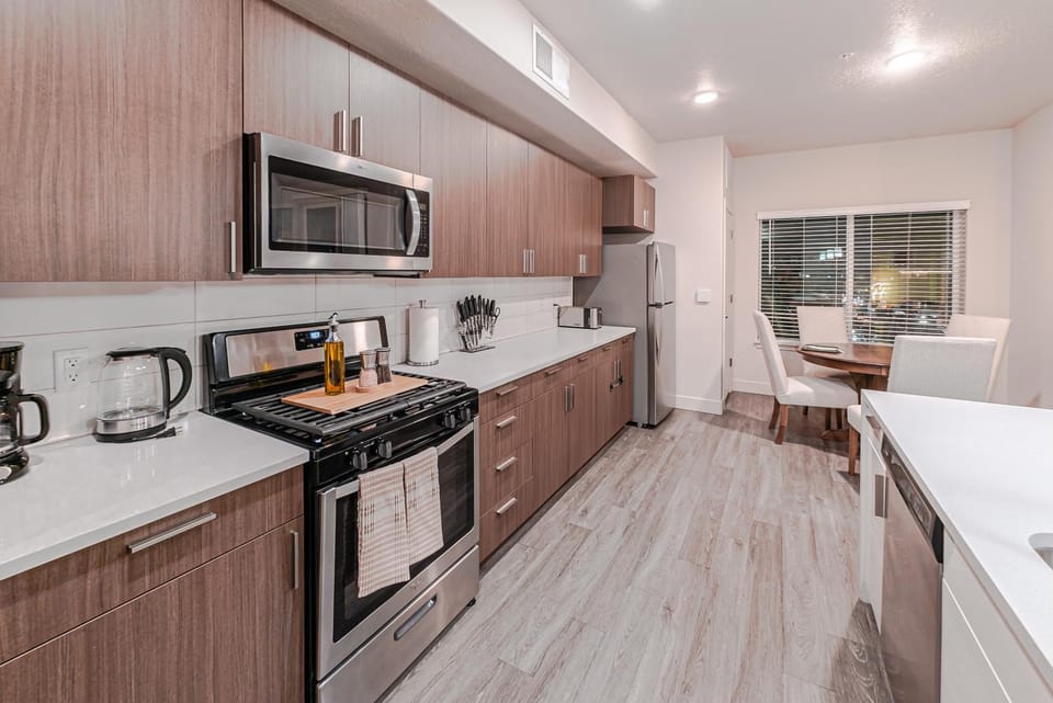 Kitchen or kitchenette, dishwasher, oven, stove, toaster