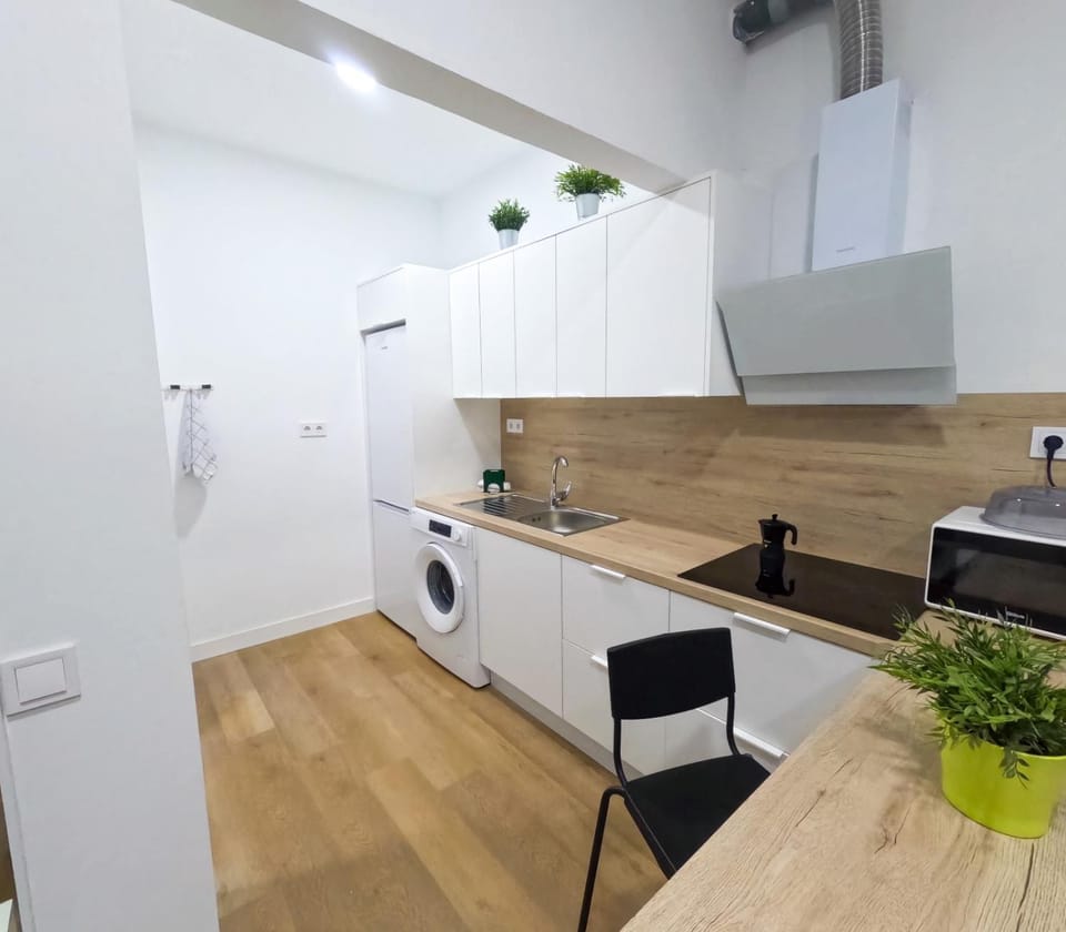 Kitchen or kitchenette, washing machine