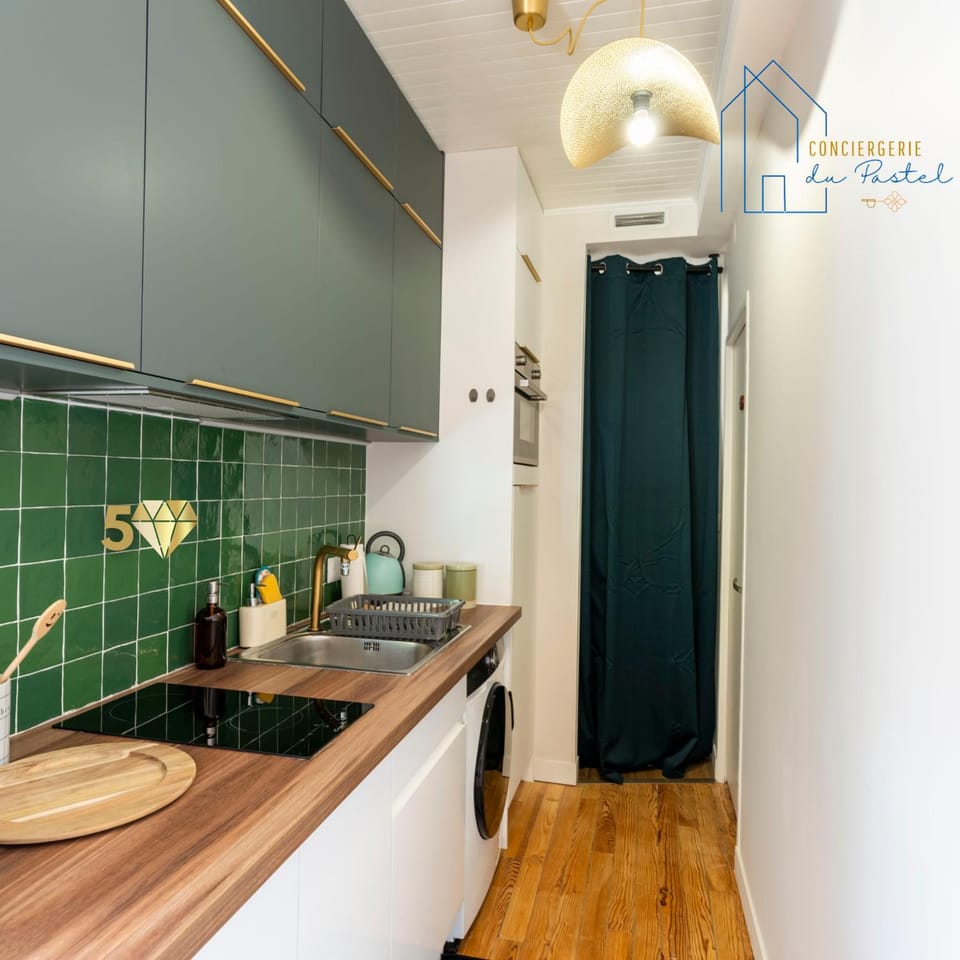 Kitchen or kitchenette, dishwasher, oven, stove, washing machine