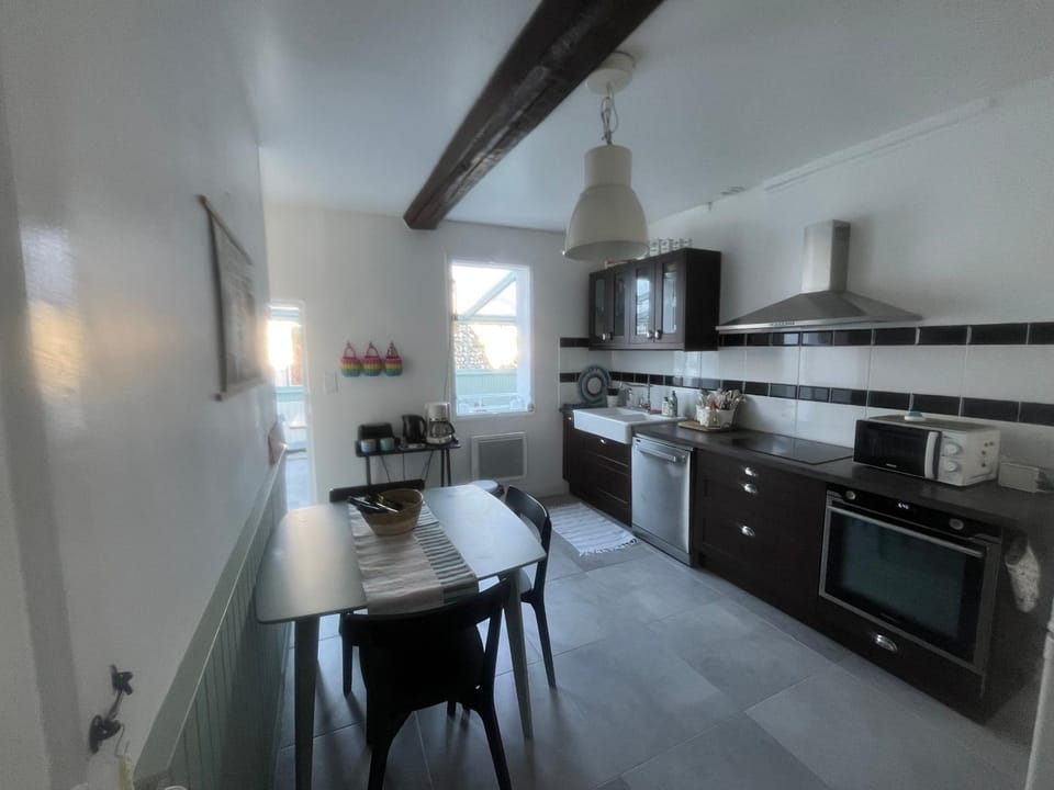 Kitchen or kitchenette, stove, kitchen