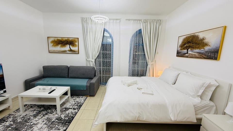 Bed, Living room, Seating area