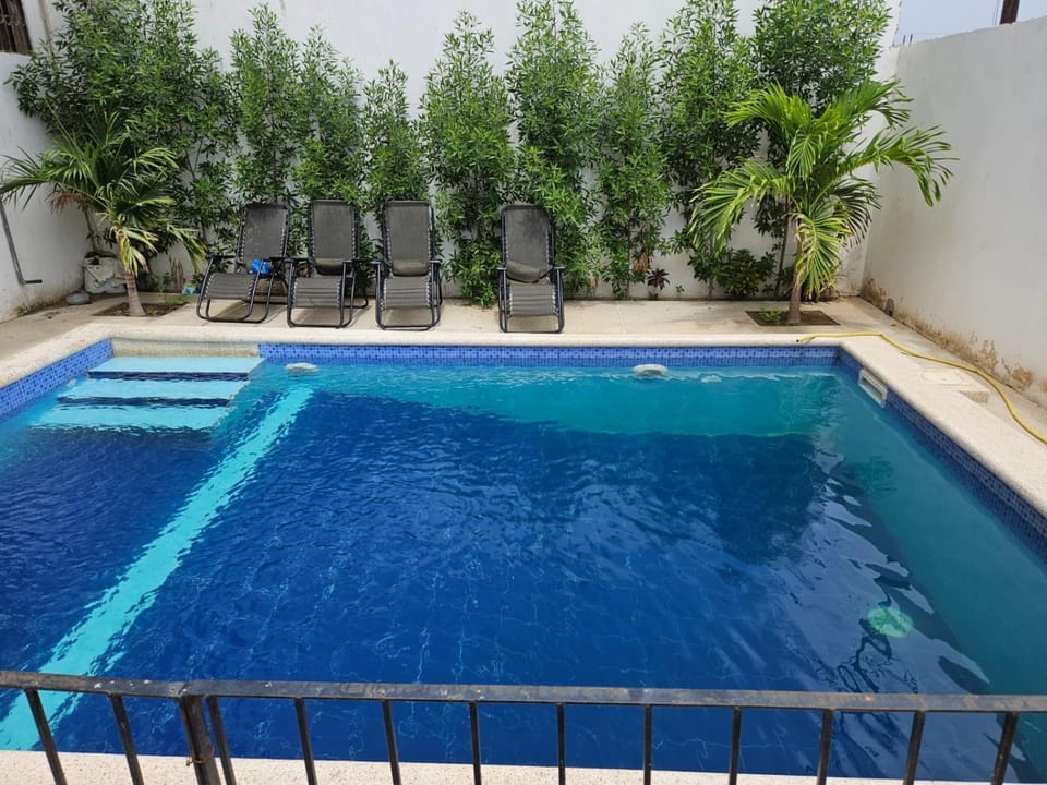 Swimming pool, sunbed