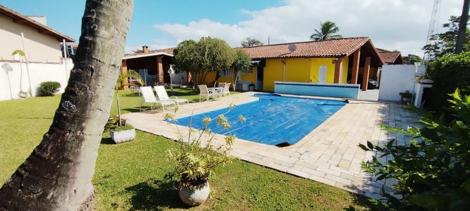 Beach House Heated pool Billiards Air conditioning House in Itanhaém
