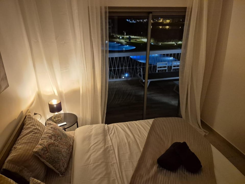 Night, View (from property/room), Balcony/Terrace, Bedroom, Pool view