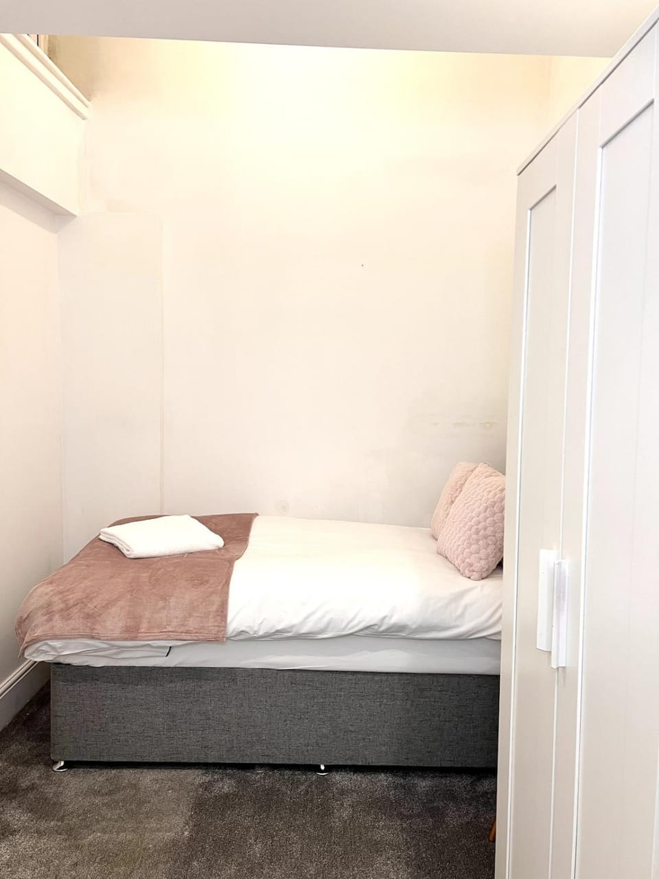 Bed, wardrobe