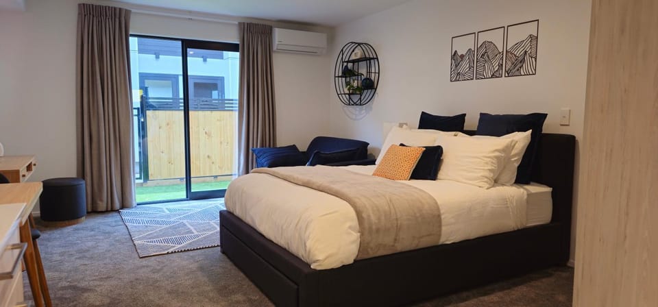 Bed, Living room, Seating area, Bedroom