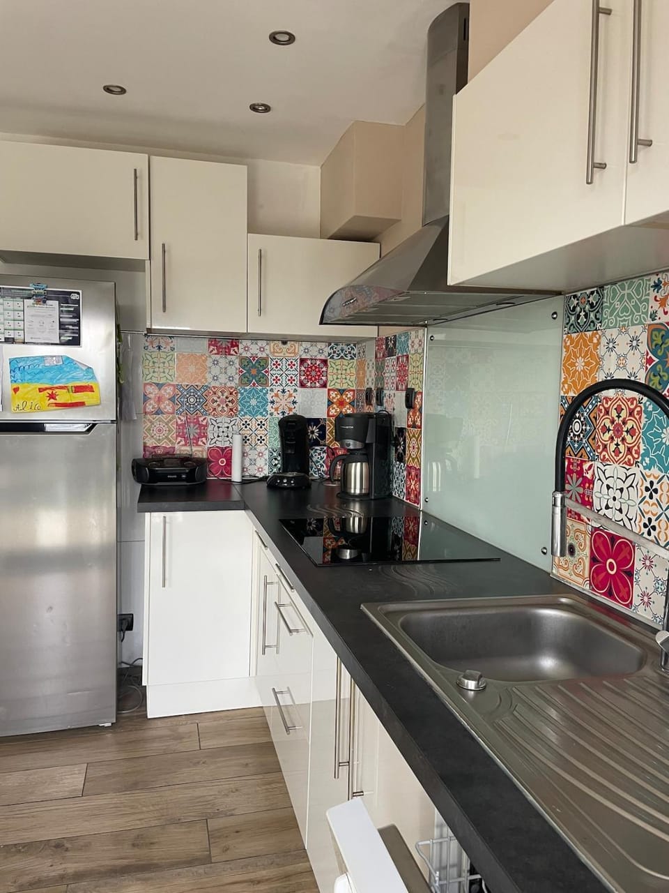 Kitchen or kitchenette, dishwasher, oven, stove, toaster