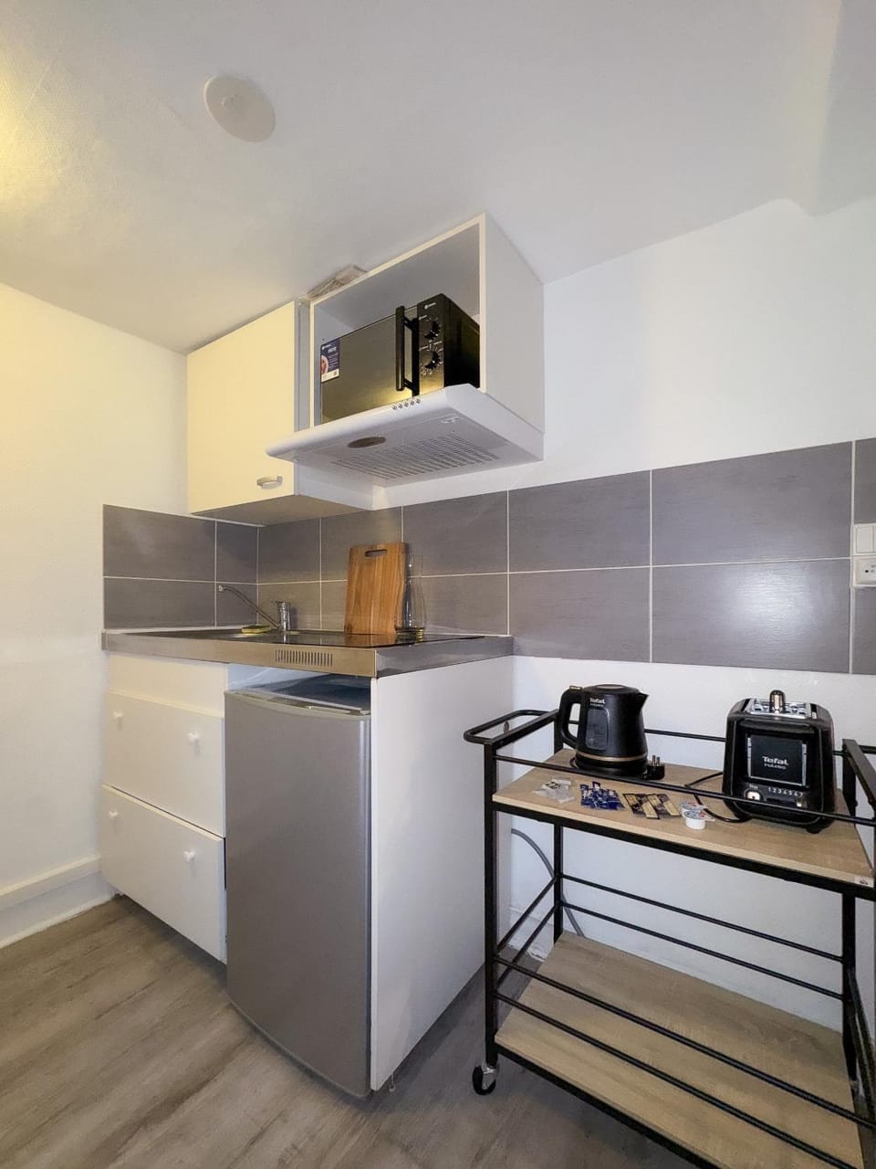 Kitchen or kitchenette, stove, toaster