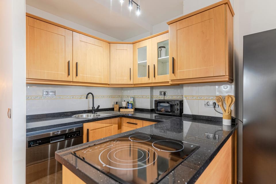 Kitchen or kitchenette, oven, stove