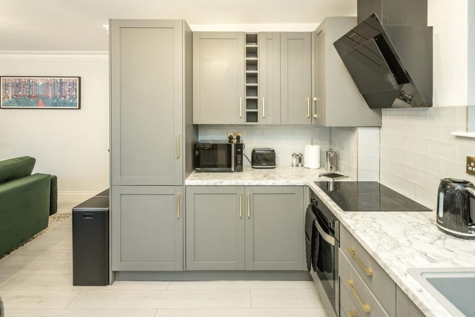 Kitchen or kitchenette, oven, stove, toaster