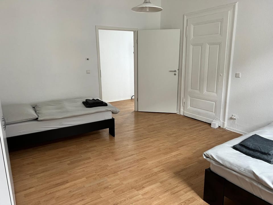 Bed, Living room, Photo of the whole room, Bedroom, towels, wardrobe