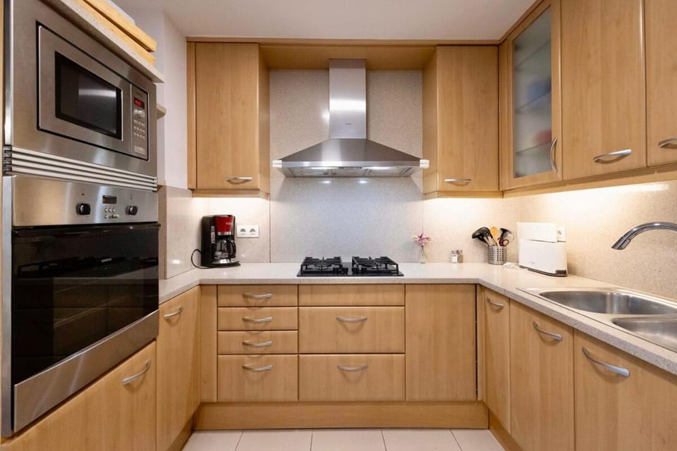 Kitchen or kitchenette, oven, stove