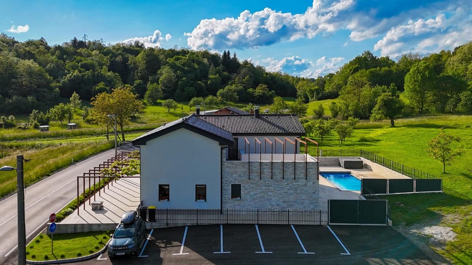 Property building, Natural landscape, Bird's eye view, Swimming pool, Parking
