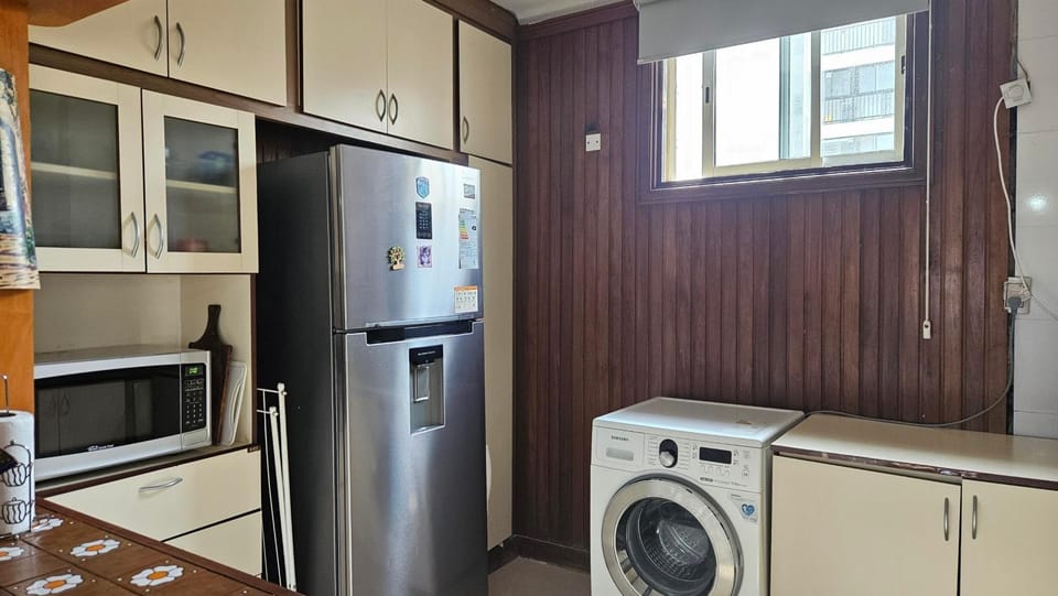 Kitchen or kitchenette, laundry
