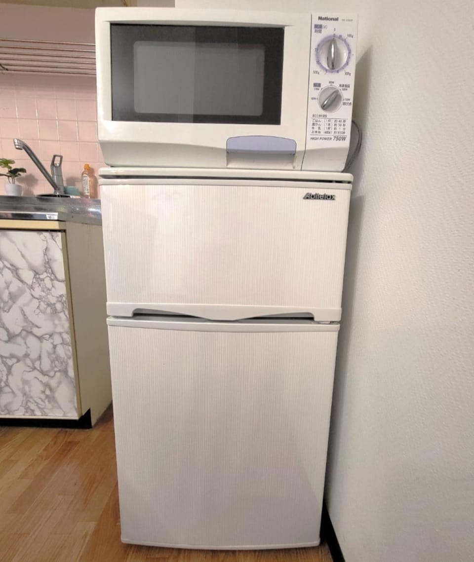 Kitchen or kitchenette, microwave