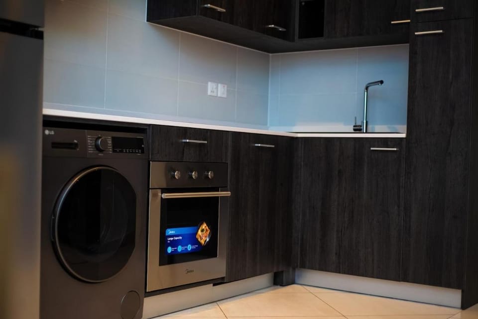 Kitchen or kitchenette, washing machine