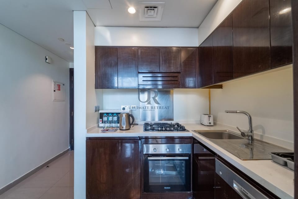 Kitchen or kitchenette, oven, stove