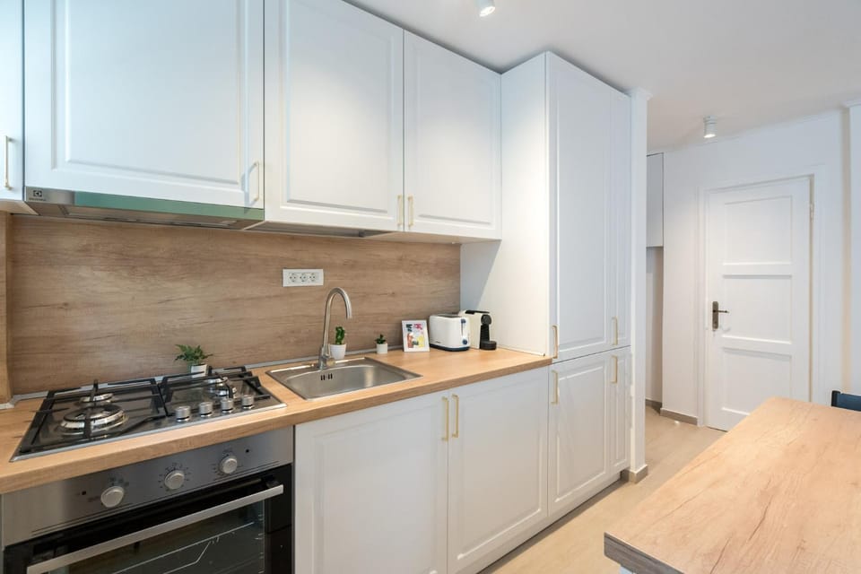 Kitchen or kitchenette, furniture, stove, toaster, kitchen