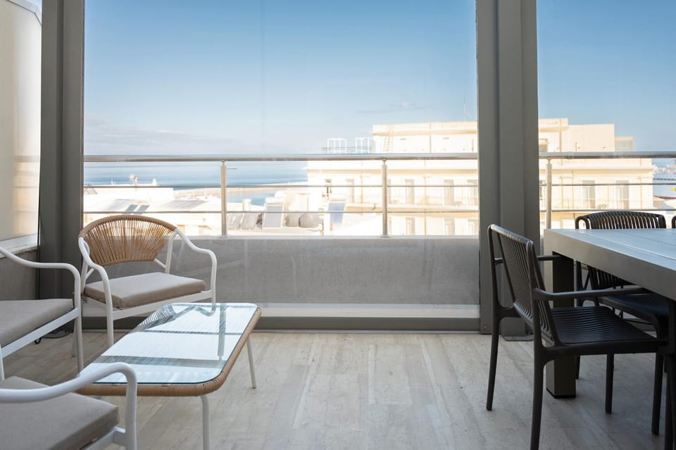 Natural landscape, View (from property/room), Balcony/Terrace, Living room, Seating area, Dining area, Sea view
