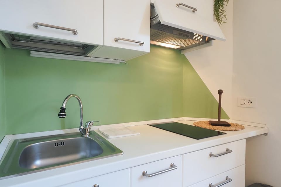 Kitchen or kitchenette, stove