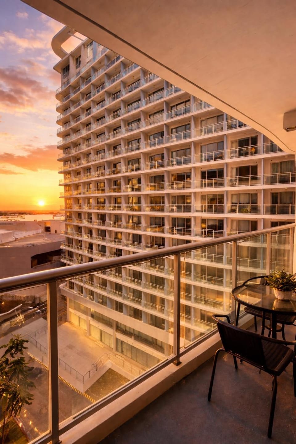 Property building, Balcony/Terrace, Seating area, Sunset