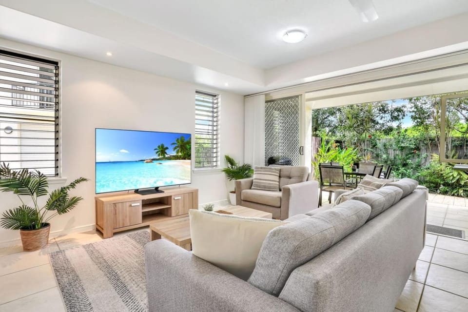 Living room, Seating area, Pool view