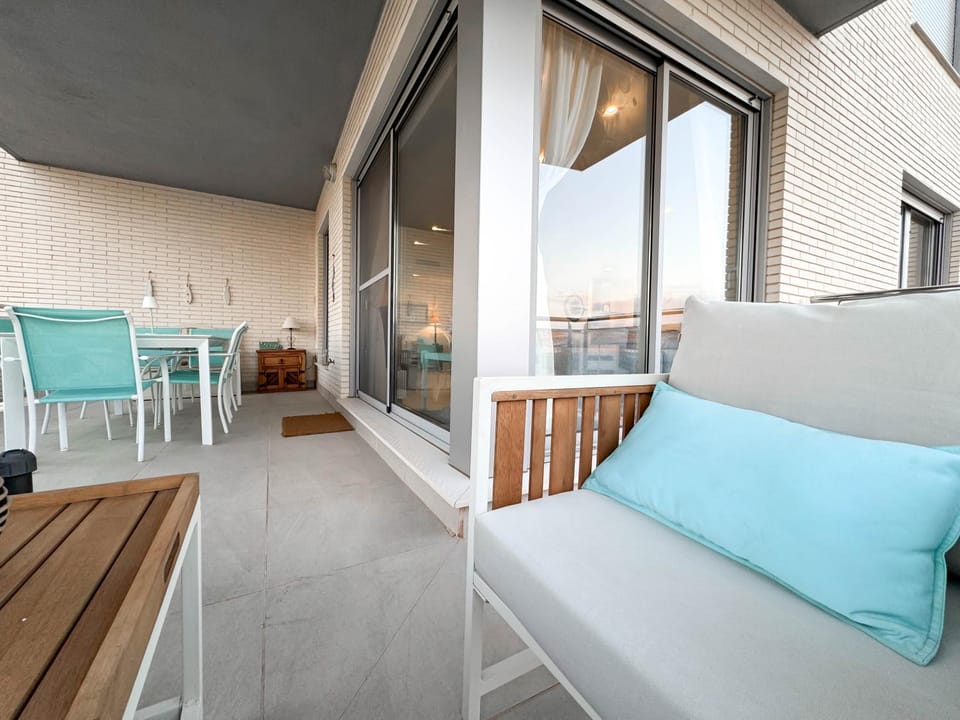 Property building, View (from property/room), Balcony/Terrace, Living room, Seating area, Swimming pool