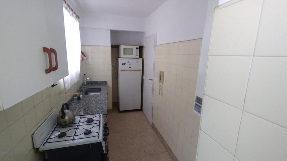 Kitchen or kitchenette, oven