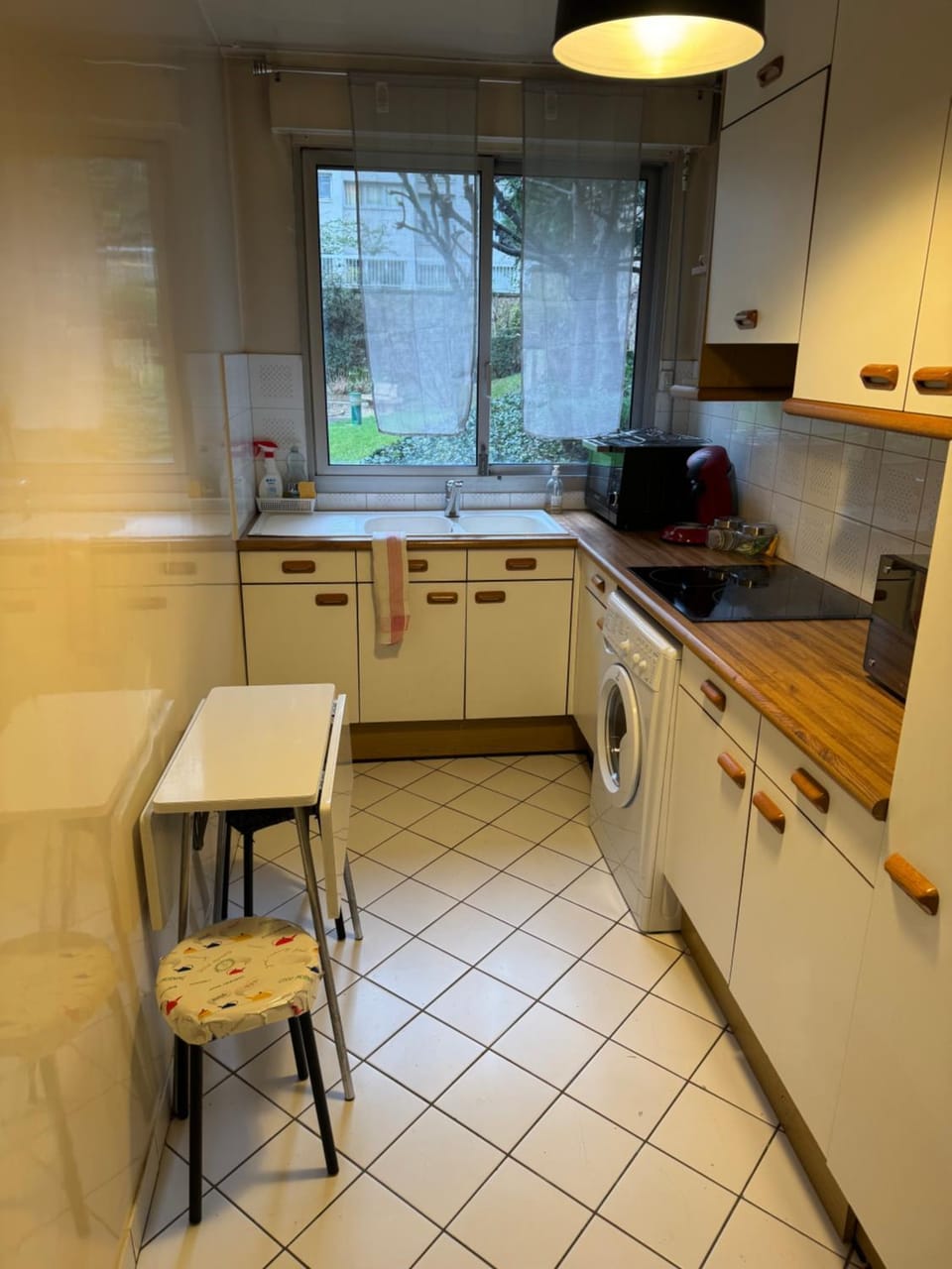 Kitchen or kitchenette, stove, washing machine