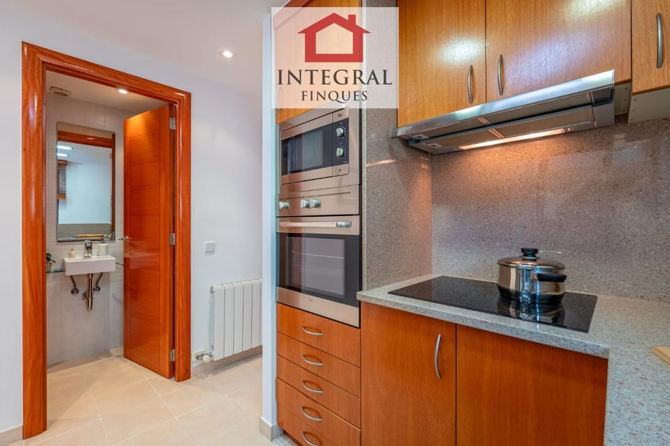 Photo of the whole room, microwave, oven, stove, kitchen