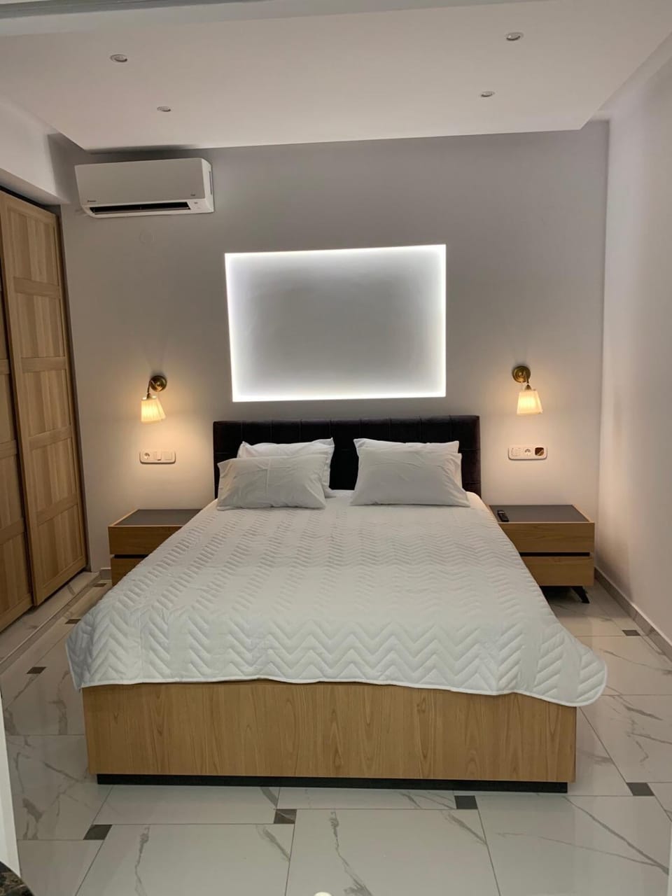 Bed, wardrobe, air conditioner
