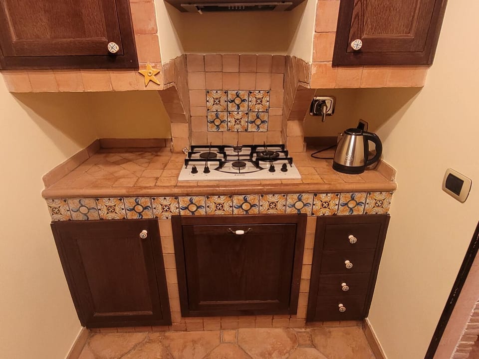 Kitchen or kitchenette, stove