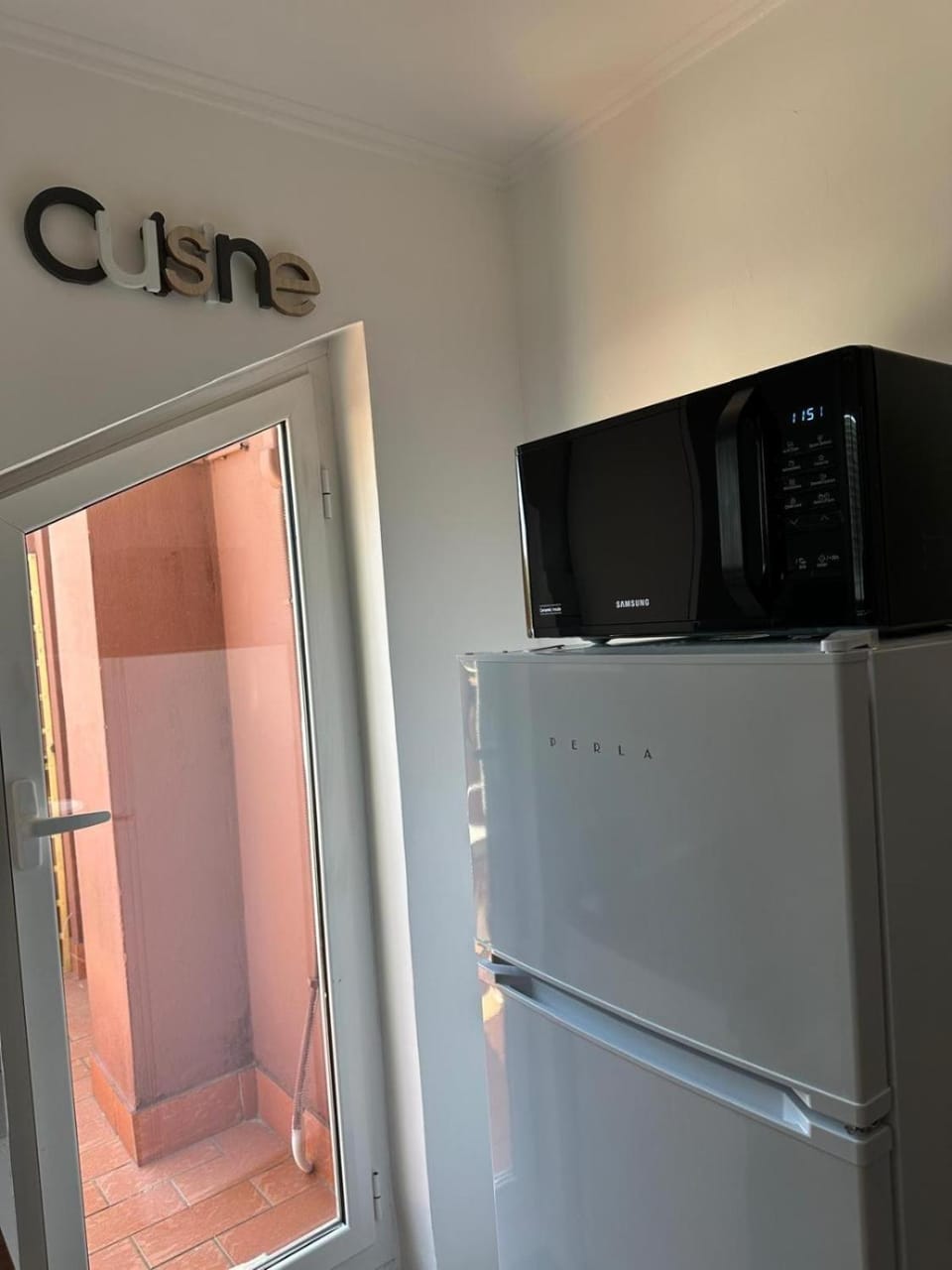 Kitchen or kitchenette, microwave
