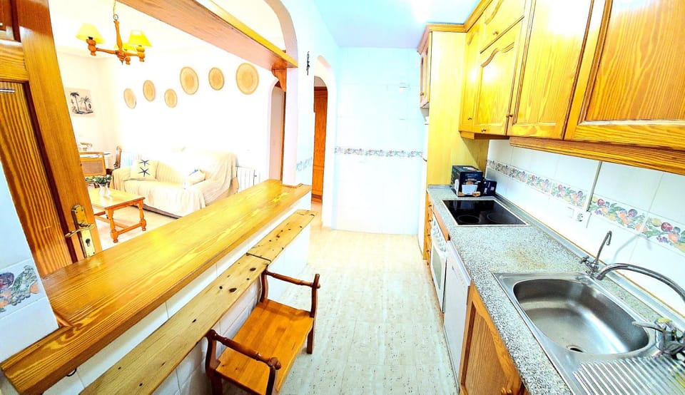 Kitchen or kitchenette, dishwasher, stove