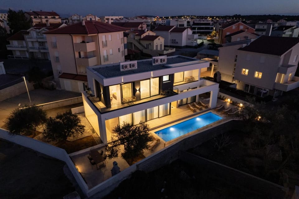 Property building, Night, Swimming pool