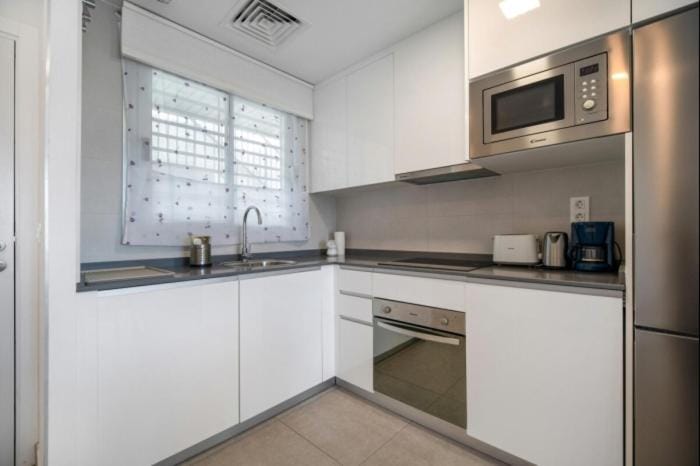 Kitchen or kitchenette, oven, toaster