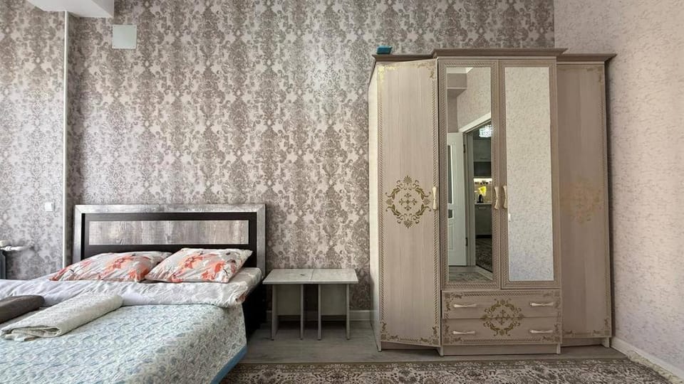 Bed, Bedroom, towels, wardrobe, air conditioner