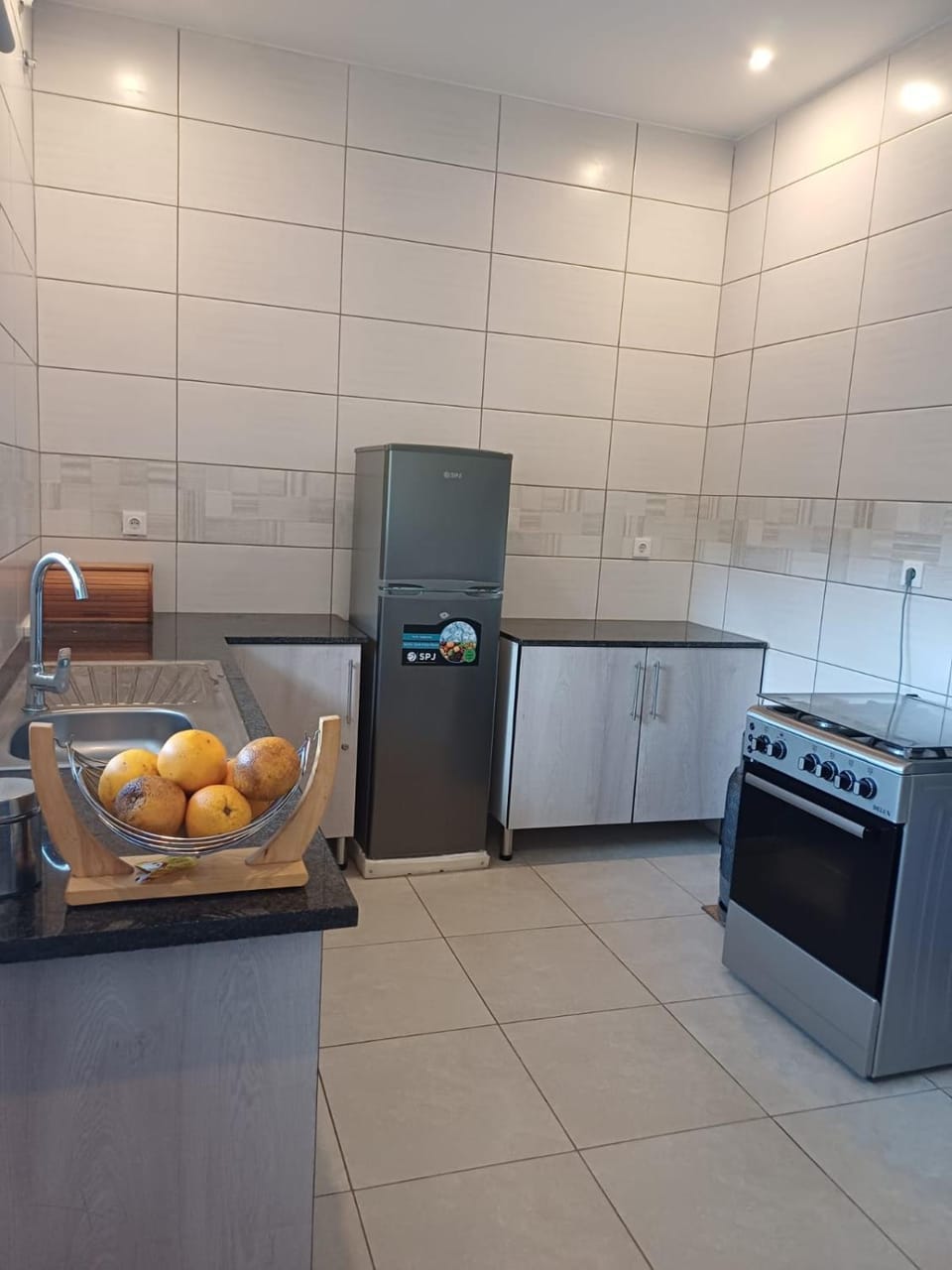 Kitchen or kitchenette, oven, stove