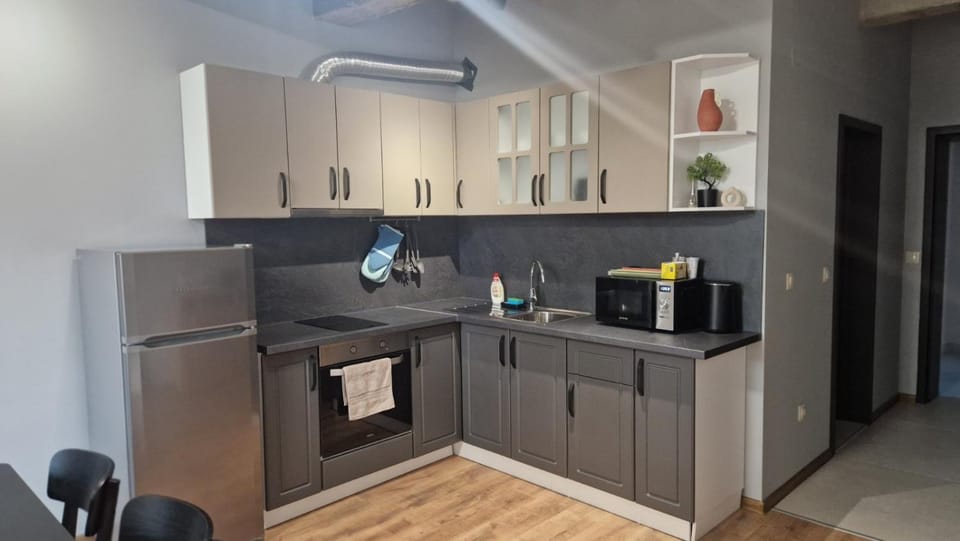 Kitchen or kitchenette, oven, stove