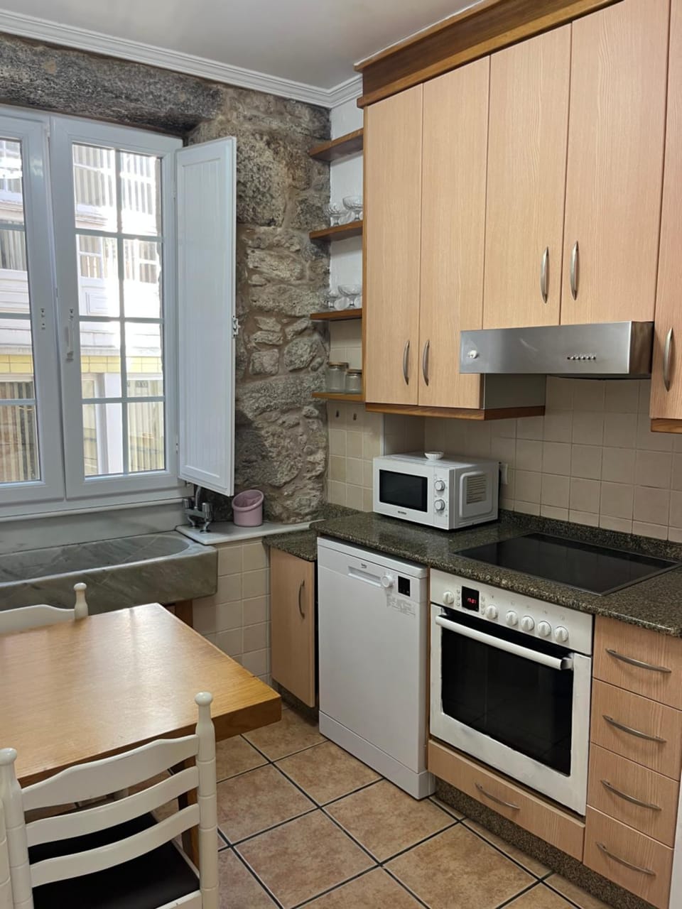 Dining area, dishwasher, oven, stove
