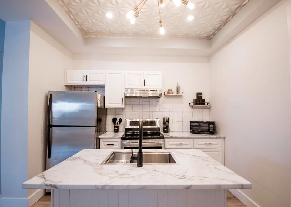 Kitchen or kitchenette, oven, stove