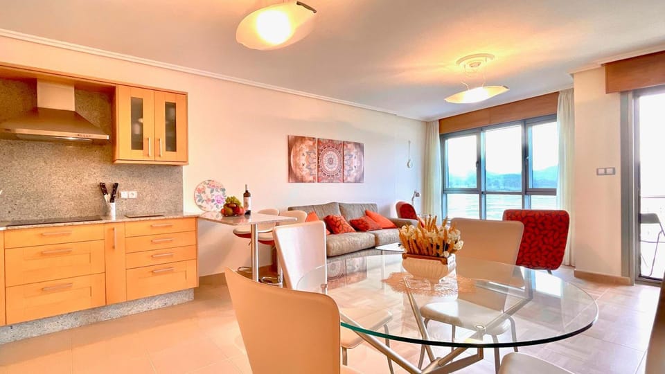 Kitchen or kitchenette, Living room, Seating area, Dining area