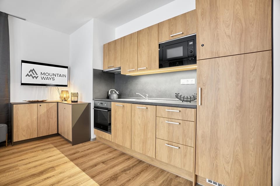 Kitchen or kitchenette, oven, stove