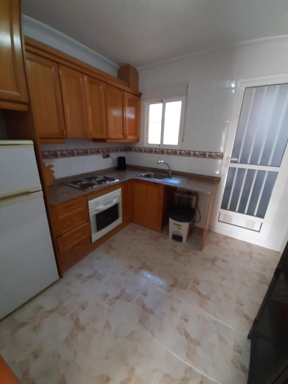 Kitchen or kitchenette, oven, stove
