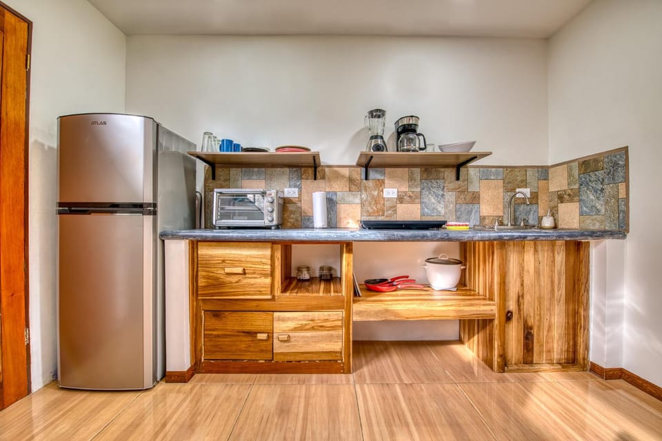 Kitchen or kitchenette, oven