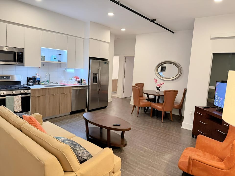 Kitchen or kitchenette, Living room, Seating area, Dining area, dishwasher, oven, stove, toaster